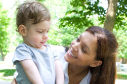 Alison Liddle (right) with a pediatric client in an outdoor setting.