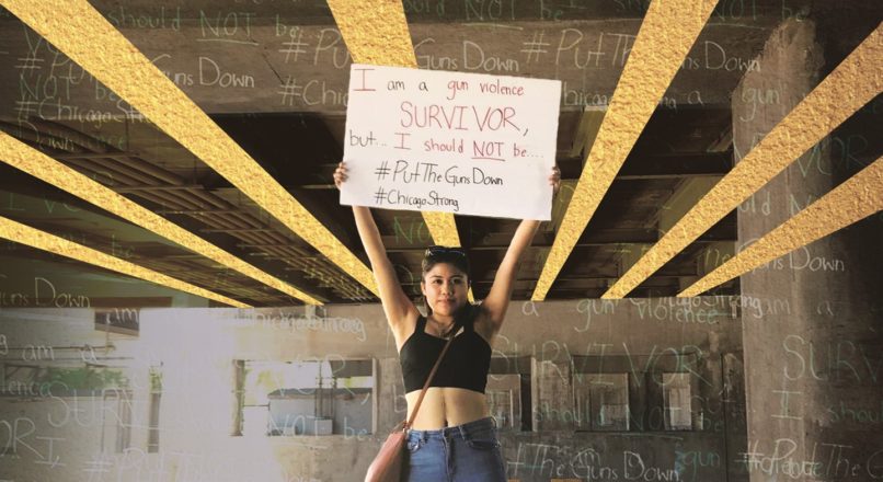 Kathy Pisabaj '22 BS NUT at a July 2018 anti-violence demonstration that shut down the northbound Dan Ryan Expressway. She wears a halter top to show scars from the injury.