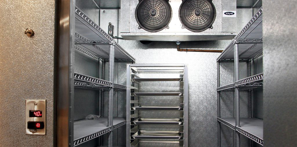 inside of commercial sized refrigerator