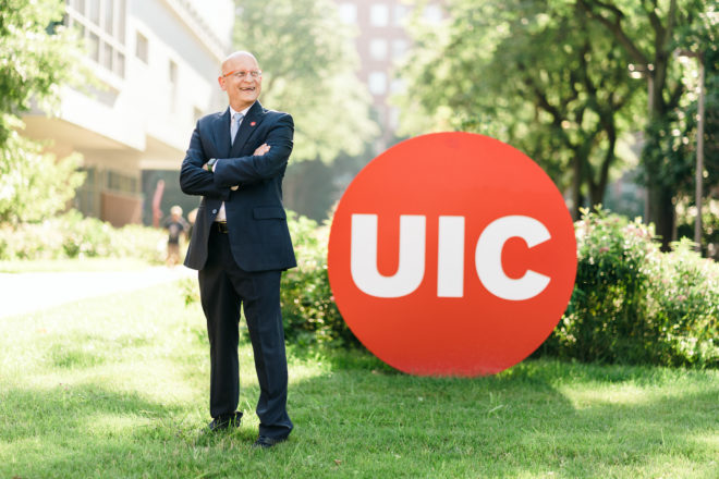 Dean Carlos J. Crespo stands in Arthington Mall on the west side of the UIC campus.